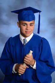 Picture of a student in a grad cap and gown